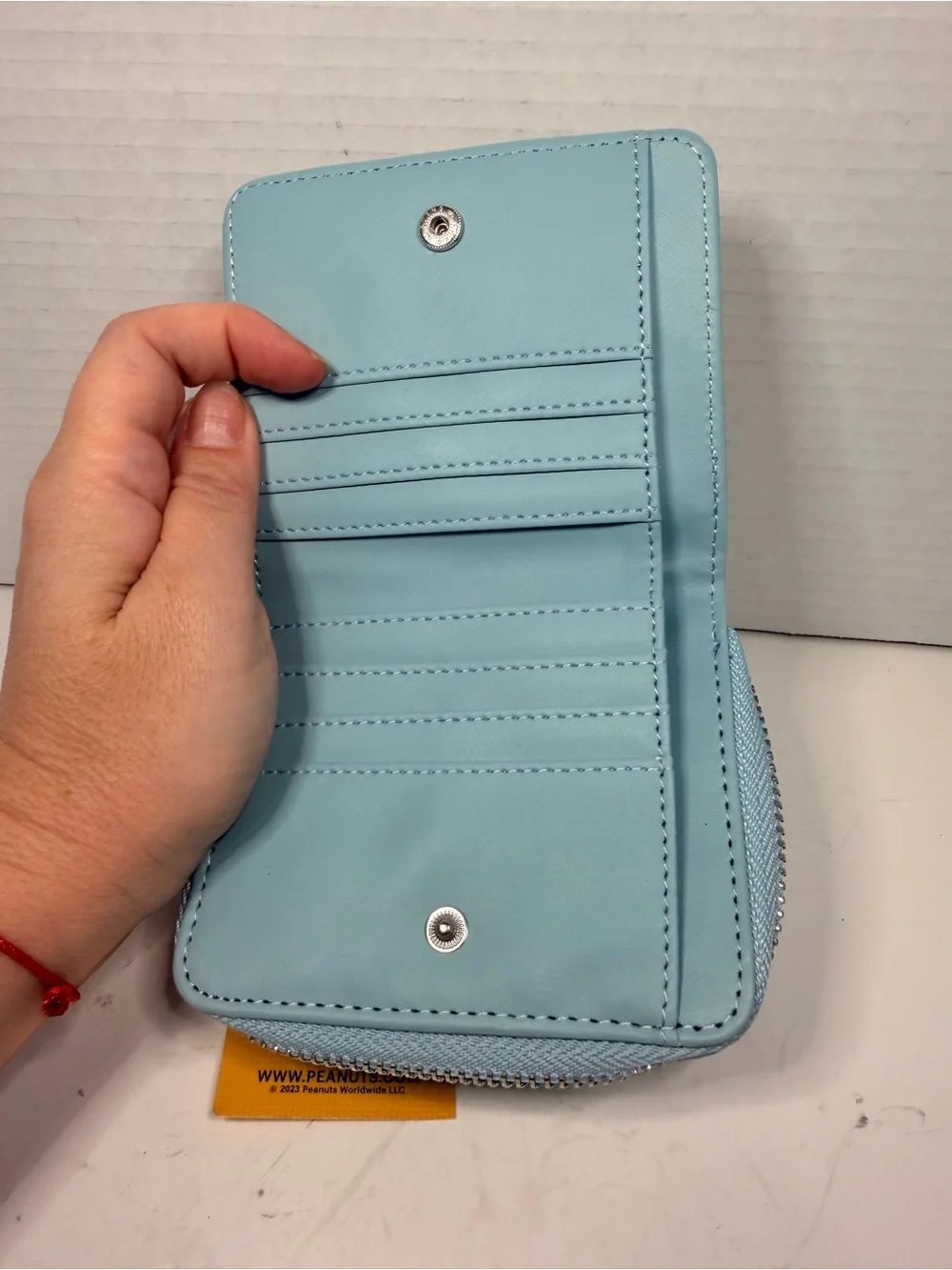 Peanuts Snoopy and Friends 'Happiness' Print Zip-Around Mini Wallet